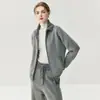 Cárdigan de cachemira con doble cremallera y bolsillos, un conjunto casual y estilizado de cachemira para mujer, con una chaqueta exterior gruesa y pantalones de pierna ancha, colección otoño/invierno 2026