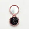 Espejo y Peine Plegable Mini Portátil de Colores Macaron, Doble Propósito para el Aseo Diario y Retoques de Maquillaje, Compacto y Fácil de Guardar