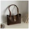 Bolsa Tote Manual Texturizada Color Block Europeia e Americana para Mulheres Verão 2026 Nova Bolsa de Ombro Único com Laço Tendência de Celebridade da Internet Bolsa de Braço