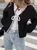 Cardigã de tricô transfronteiriço europeu e americano, novo estilo outono e inverno, com amarração, blusa solta de manga longa cor sólida, jaqueta de moda feminina