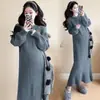 Ropa de maternidad otoño e invierno holgada de moda nuevo estilo purpurina fina engrosado temperamento adelgazante suéter de punto dulce de moda falda de cola de pez