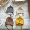 Gorro de Bebé Estilo Coreano Otoño e Invierno Cálido de Lana Lindo Color Sólido Versátil con Portachupete Tejido para Bebé Niño y Niña Gorro con Protección para las Orejas