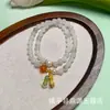 Pulsera de 2 hilos de Jade Natural de Tianshan de Xinjiang con un dije en forma de calabaza, un diseño creativo para joyería femenina, con una piedra de jade estampada y múltiples hilos