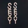 Pendientes de botón de cadena estilo europeo y americano, pendientes de alta gama de moda, pendientes personalizados, diseño de nicho, dulces, geniales, nuevos, pendientes populares