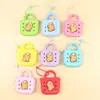 Monederos de silicona al por mayor, billeteras pequeñas, estuches para auriculares, llaveros para niñas, bolsos pequeños de mano y accesorios para mochilas en colores macaron