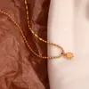 Moda Europea y Americana Nicho Elegante Collar Acero Inoxidable Chapado en Oro de 18K Asimétrico Cuentas de Arroz Cadena de Cuentas Redondas Collar de Circonita para Mujeres