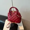 Bolsa de Textura de Moda de Comercio Exterior para Mujer 2026 Nueva con Relieve de Cuadros Tipo Concha Versátil de Hombro Único para Debajo del Brazo Bolso de Mano para Dama