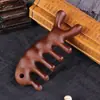 Pente de massagem Dolphin pente de madeira couro cabeludo pente Meridiano multifuncional ombro e pescoço olhos sândalo seda dourada pente de massagem atacado