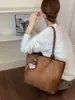 Elegante y minimalista bolsa de mano de gran capacidad para mujer, nueva colección 2026, bolso de hombro versátil y a la moda, adecuado para ir al trabajo y para el uso diario