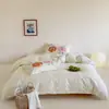 Conjunto de cama de quatro peças estilo cartoon classe A, fresco e simples, 100% algodão, algodão lavado, apresentando designs fofos e versáteis, adequado para dormitórios estudantis, e disponível como um conjunto de três peças