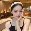 Faixa de cabelo de camélia Xiangfeng de alta qualidade, faixa de cabeça de luxo de alta qualidade, nova faixa de cabelo de rede popular para viagem, Coreia