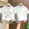 Camiseta de manga comprida para meninas, estilo primavera/outono, nova coleção 2026, peça básica da moda para crianças, algodão puro, blusa falsa de duas peças para meninas pequenas