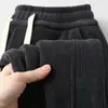 Calça de moletom jogger masculina versátil de veludo cotelê espesso de outono, calça casual estilo coreano plus size, tamanho extra grande