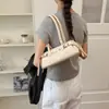 Bolsa Pequena de Bolinhas Feminina 2026 Novo Estilo Bolsa de Mão Texturizada Bolsa Baguete Verão Alta Qualidade Bolsa de Ombro Transversal para o Trabalho