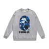 Outono e inverno estilo japonês marca da moda estampa de desenho animado cabeça de macaco unissex jovem moletom de gola redonda folgado atacado e dropshipping