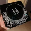 Aretes Colgantes y Collar de Flor de Circonita Brillante Estilo Corte Europeo y Americano, Cadena Ligera de Lujo Nicho para Clavícula, Joyería Exquisita Transfronteriza