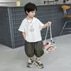 Traje de Verano de Manga Corta para Niños 2026 Nuevo Estilo Ropa Delgada de Verano para Niños Pantalones Cortos de Linterna para Bebé Conjunto de Dos Piezas