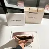Dropshipping Bolso de Axila Rosa de Luna Creciente de Nicho de Gama Alta 2025 Nuevo Bolso Versátil tipo Baguette para Hombro al por Mayor