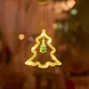 Cena de decoração de natal layout vitrine criativa pequenos enfeites pingentes de árvore de natal vestir atmosfera luzes