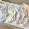 Calcetines de mujer a rayas color crema hasta la pantorrilla, finos y sencillos para primavera y verano, estilo coreano moderno, adecuados para estudiantes, calcetines largos de verano estilo japonés