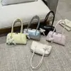 Bolsa de Braço com Laço para Mulheres 2026 Novo Design de Nicho Casual Versátil Grande Capacidade para o Trabalho Diário Bolsa de Mão