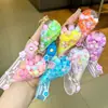 Llavero creativo de piruleta rellena de aceite con arena líquida, colgante flotante de helado, colgante para bolsa al por mayor, decoración linda