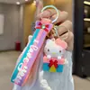 Chaveiro de caixa de presente Sanrio, pingente de mochila, boneca de desenho animado fofa, enfeite de chaveiro de carro, atacado de pequenos presentes