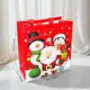 Bolsa Impermeable Navideña para Llevar Bolsa No Tejida Bolsa de Compras de Dulces Bolso de Mano Bolsa de Regalo para Fiesta Mayoreo