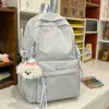 Nova mochila simples estilo coreano com laço, fresca e de grande capacidade, doce e versátil, adequada para alunos do ensino fundamental II e médio, alto valor estético