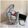 Nova bolsa de ombro fofa para meninas Hello Kitty bolsa de trabalho versátil desenho animado grande capacidade listrada bolsa de reforço transfronteiriça