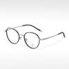 Gafas de montura ovalada pequeña y fresca, pegamento dorado de moda T22055, semi-titanio, se pueden equipar con montura óptica para miopía, anti-luz azul
