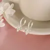 Nuevos Pendientes Cortos de Lazo y Borla Estilo Niche para Mujer, Pendientes Versátiles y de Lujo con Colgante de Circonita
