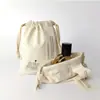 Bolsas de algodón y lino con cordón, directo de fábrica, con patrones de logo impresos para guardar regalos de aromaterapia y perfume.