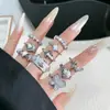 Estilo Medieval Tardío Elegante Dulce Fresco Blanco Esmalte de Goteo Mariposa Saturno Anillo de Moda Anillo Geométrico Simple de Personalidad de Nicho para Mujeres