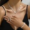 Accesorios de novia sencillos de moda transfronteriza 2024: collar, pendientes, pulsera y anillo de diamantes de imitación dorados.