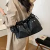 Bolso bandolera de hombro grande de moda casual para mujer, nuevo, con textura, cierre de cordón versátil 2026