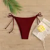 Nuevos Sexy 2026 Triángulo Aguas Termales Color Sólido Estilo Europeo y Americano Bañador para Hombre Venta al por Mayor Transfronterizo Atado Traje de Baño de Playa Bikini para Mujer