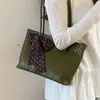 Bolsa de mano de lujo de alta gama para mujer, nuevo modelo de verano 2026, bolso de hombro con patrón tejido de nicho, bolso de mano de gran capacidad