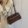 Bolso de gamuza para mujer, nuevo y moderno estilo retro de otoño 2026, adecuado para ir al trabajo, bolso de hombro de gran capacidad, bolso de axila