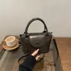 Bolso Vintage Popular de Moda para Mujer 2026 Primavera/Verano Nuevo Bolso Cruzado Casual con Solapa Estilo Coreano Bolso de Mano Bolso Cubo