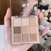 Muge Leen Paleta de Sombras de Ojos de Nueve Colores Mate Perlado Polvo Ahumado Rosa Color Melocotón Tierra Color Té con Leche Asequible Paleta de Sombras de Ojos Ins