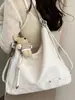 Bolso de hombro liso nuevo para principios de otoño de 2026 para el trabajo y los desplazamientos, bolso cruzado personalizado informal de gran capacidad a la moda