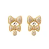 Brincos de Tarraxa Prata Super Brilhantes com Cravação de Diamante e Design de Laço, Luxuosos e Sofisticados, Brincos Exquisitos e Versáteis para Mulheres