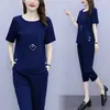 Traje de Verano Talla Grande Moda Casual Elegante Moderno Adelgazante de Gama Alta Camiseta de Manga Corta Pantalones Capri Conjunto de Dos Piezas Ropa para Mujer
