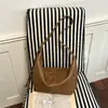 Bolso de hombro único de textura retro de moda, estilo coreano de nicho, nuevo artículo de otoño 2026 para el trabajo, para ir al trabajo, gran capacidad, bolso de axila moderno