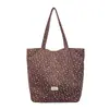 Bolsa de lona floral estilo coreano para mulheres, nova coleção 2026, com design descontraído e casual, grande capacidade e estilo versátil adequado para o uso diário e para ir ao trabalho.