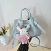Bolso tipo cubo de color caramelo con estampado de lichi coreano para mujer, nuevo bolso tote versátil de verano 2026, bolso de hombro y cruzado para ir al trabajo