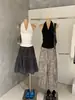 Wgwe8795 Guangzhou Shisanxing Novo Top Feminino Primavera/Verão com Decote V com Renda e Gola Halter Sem Mangas Tendência