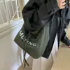 Bolsa de Lona Feminina Grande Capacidade 2025 Nova Outono e Inverno Nicho Ombro Único Transversal Bolsa Tote de Classe para Estudante de Alta Qualidade