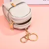 Nuevo mini monedero de PU mini lindo mochila pequeña bolsa para llaves bolsa para guardar cable de datos labial venta al por mayor de fábrica